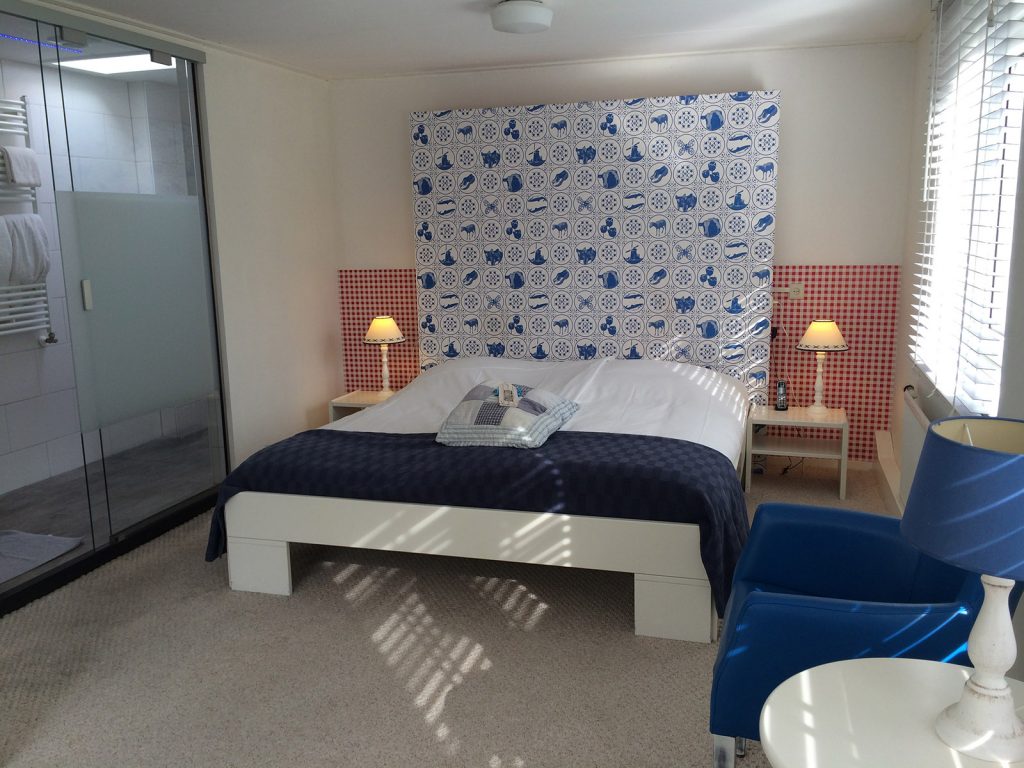 Hotel Kijkduin VisitDomburg - foto van bed op hotelkamer